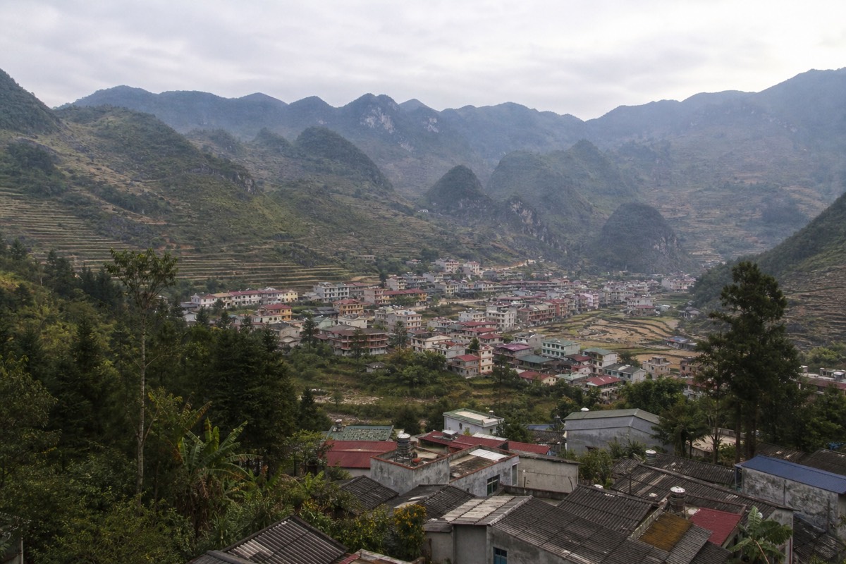 Small mountain town of Meo Vac sitting in a high valley surrounded by karst peaks in Ha Giang province, Vietnam